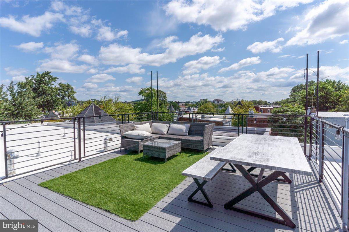 1121 G Street Northeast, Unit 3 Washington, DC 20002 - Photo 29 of 37 Fun rooftop deck with featured PLUS outdoor movies