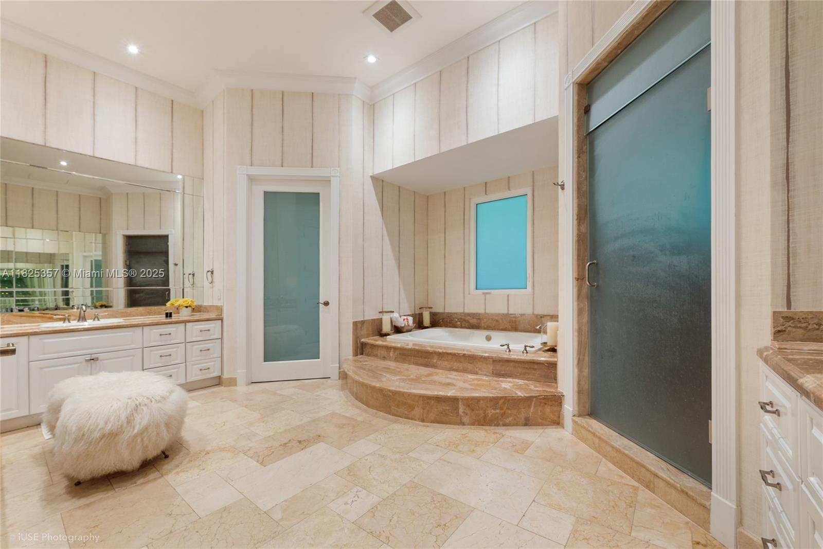 7405 Southwest 104th Street Pinecrest, FL 33156 - Photo 17 of 23 a spacious bathroom with a tub and shower