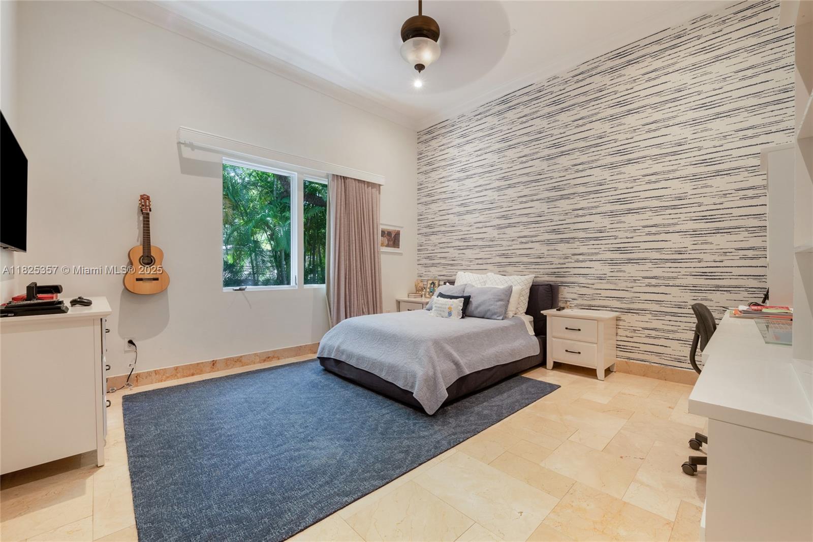 7405 Southwest 104th Street Pinecrest, FL 33156 - Photo 20 of 23 a bedroom with furniture and a window