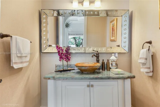 a kitchen with a sink and a window