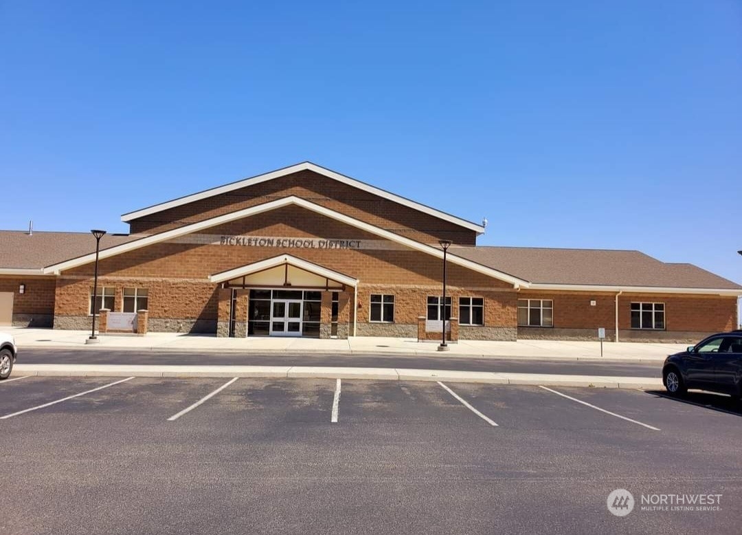 205 Middle Road Bickleton, WA 99322 - Photo 16 of 19 a front view of a house with a yard