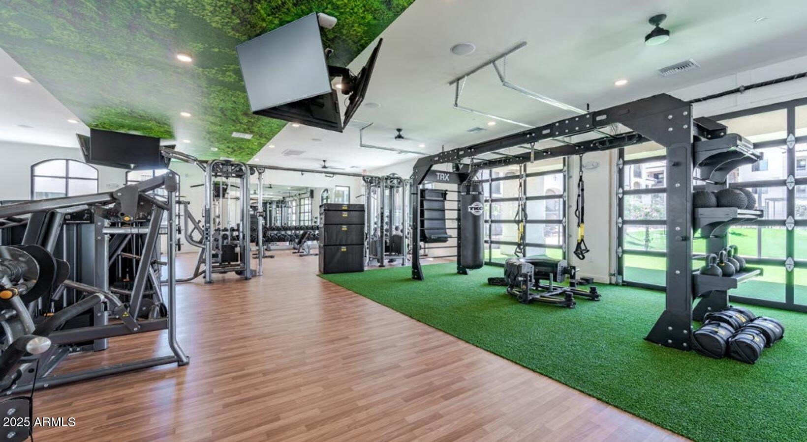 5885 South 32nd Street, Unit B2 Phoenix, AZ 85040 - Photo 16 of 33 a view of a room with lots of gym equipment