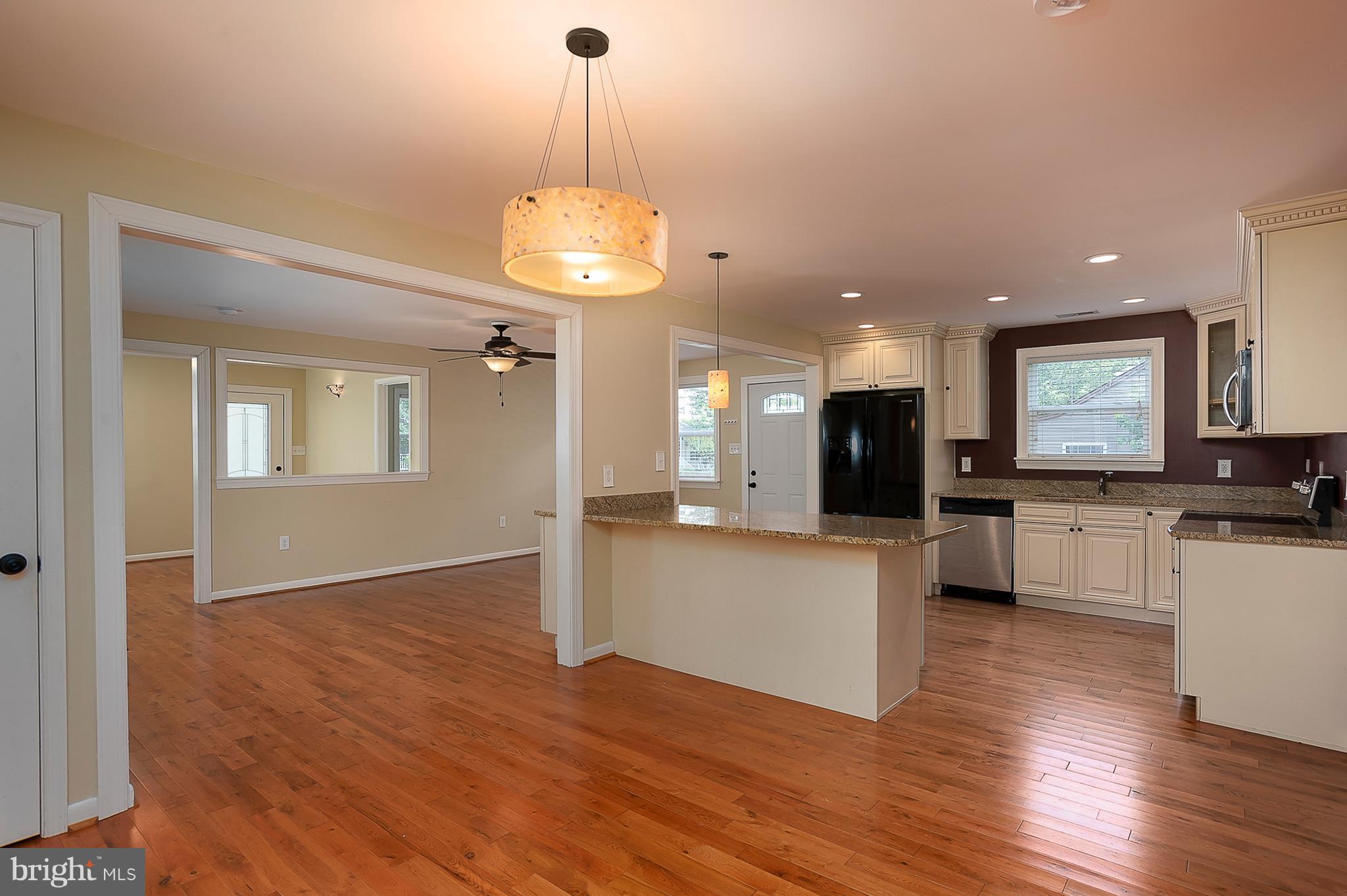 1718 Tacoma Road Edgewater, MD 21037 - Photo 13 of 30 a view of a kitchen with microwave and cabinets