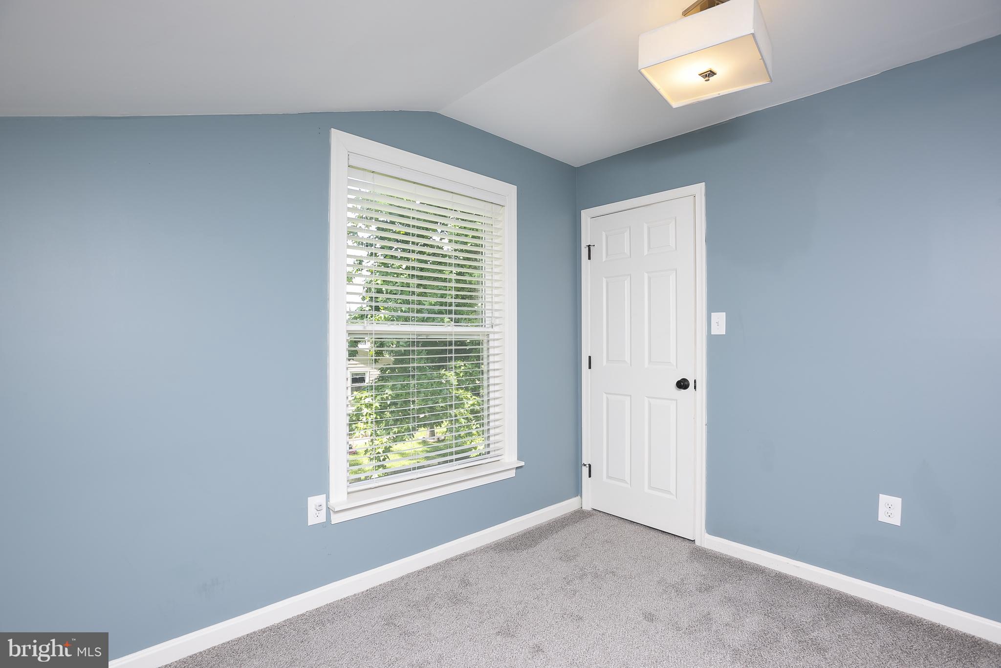 1718 Tacoma Road Edgewater, MD 21037 - Photo 21 of 30 a view of an empty room with a window