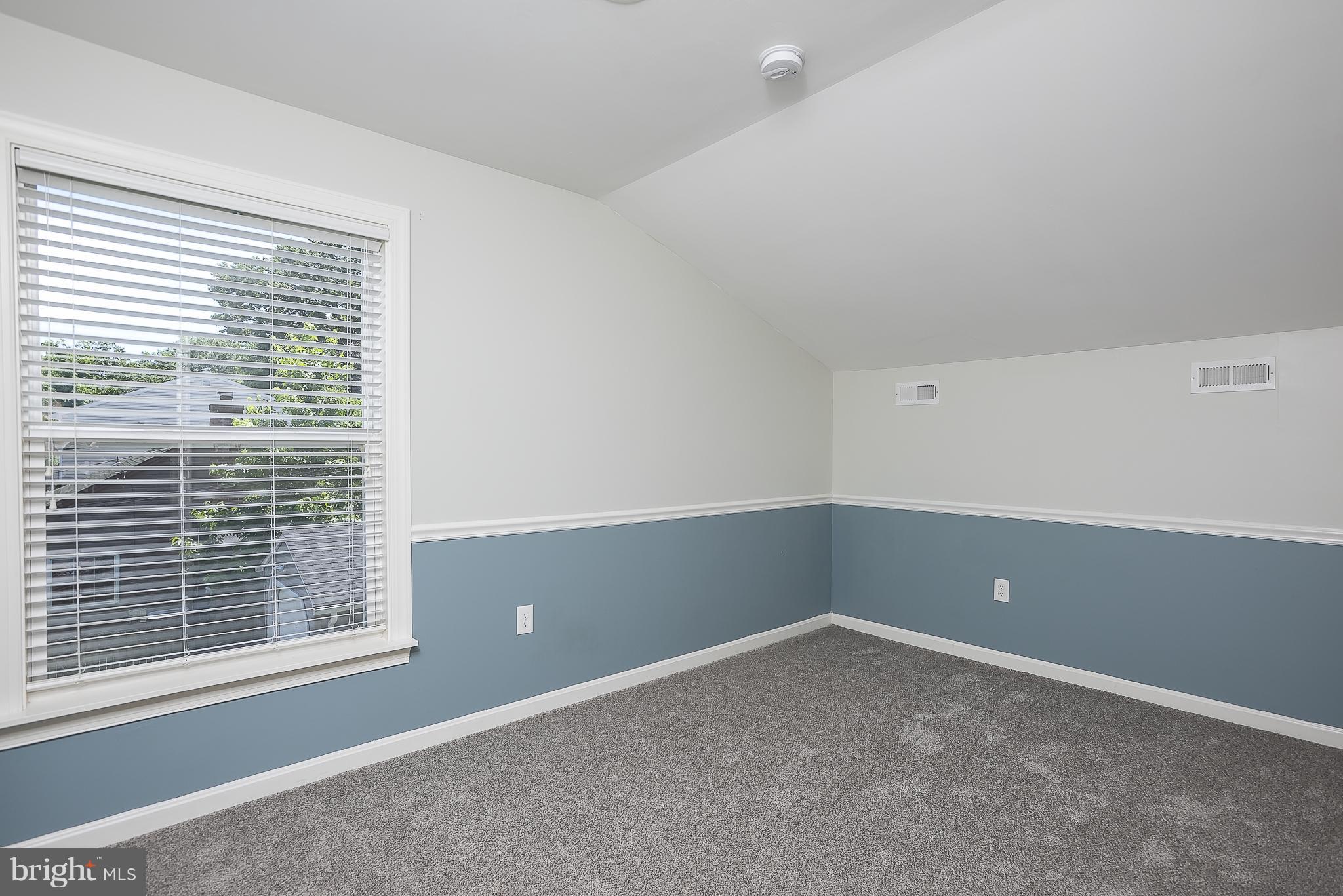 1718 Tacoma Road Edgewater, MD 21037 - Photo 23 of 30 a view of an empty room with a window