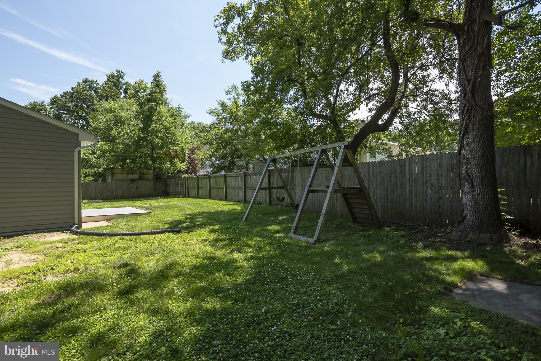 1718 Tacoma Road Edgewater, MD 21037 - Photo 24 of 30 a view of a backyard with a trampoline