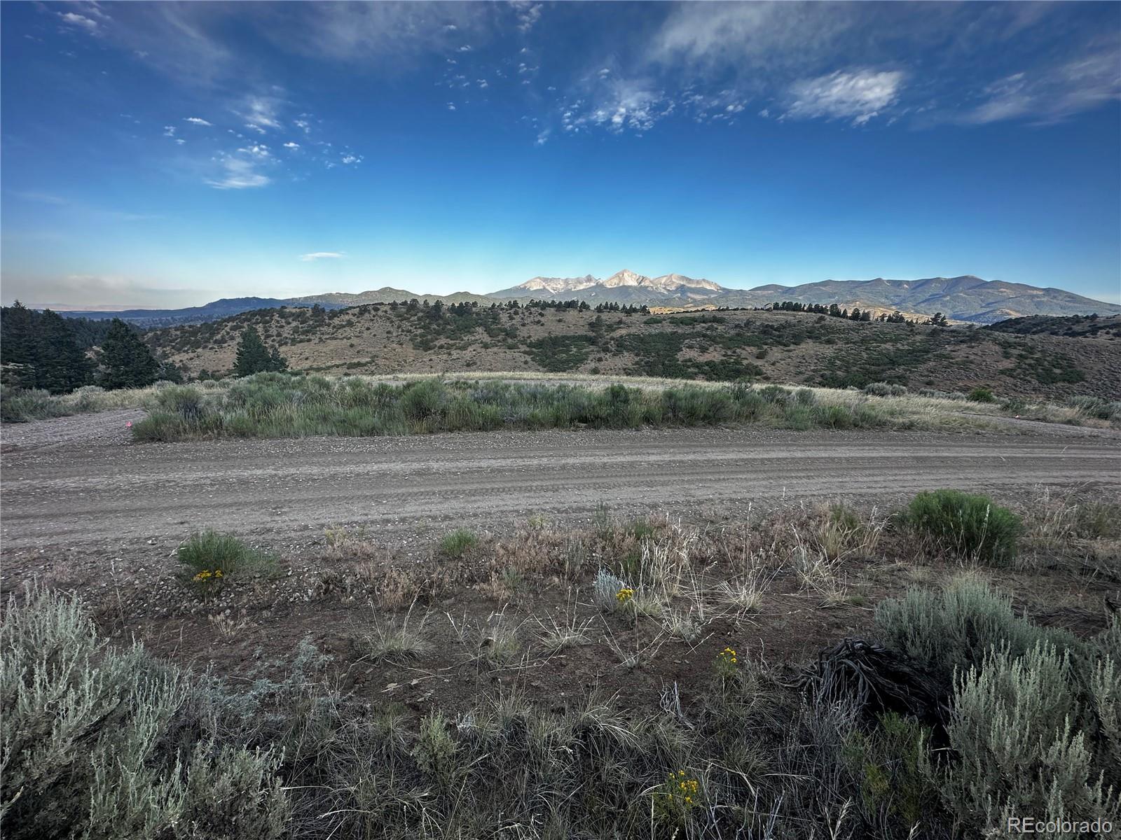 134 Schierl Road Fort Garland, CO 81133 - Photo 2 of 12 a view of dirt yard with mountain view