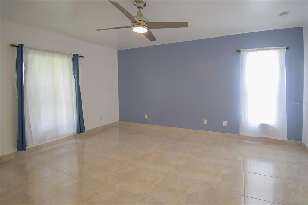 4913 Cromey Road North Port, FL 34288 - Photo 13 of 26 a view of an empty room with a window
