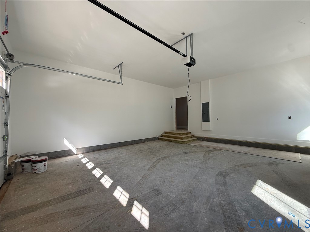295 Merifield Drive Clarksville, VA 23927 - Photo 13 of 32 a view of a room with wooden floor and windows