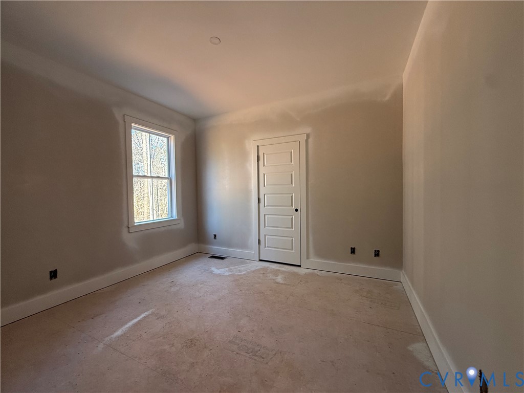 295 Merifield Drive Clarksville, VA 23927 - Photo 20 of 32 an empty room with windows