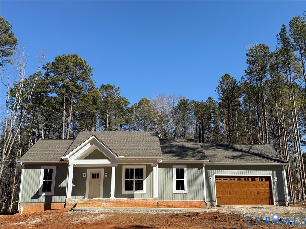 295 Merifield Drive Clarksville, VA 23927 - Photo 2 of 32 a front view of a house with a yard
