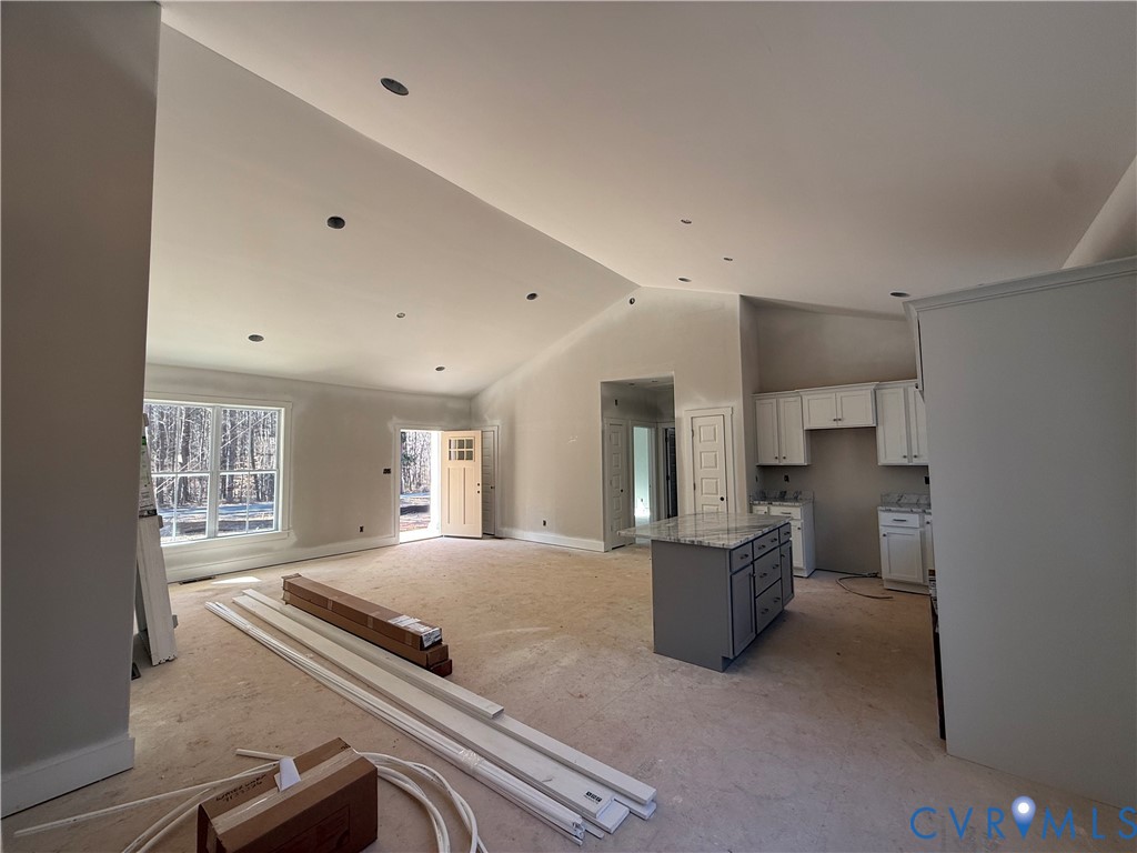295 Merifield Drive Clarksville, VA 23927 - Photo 21 of 32 a kitchen with a refrigerator and a sink