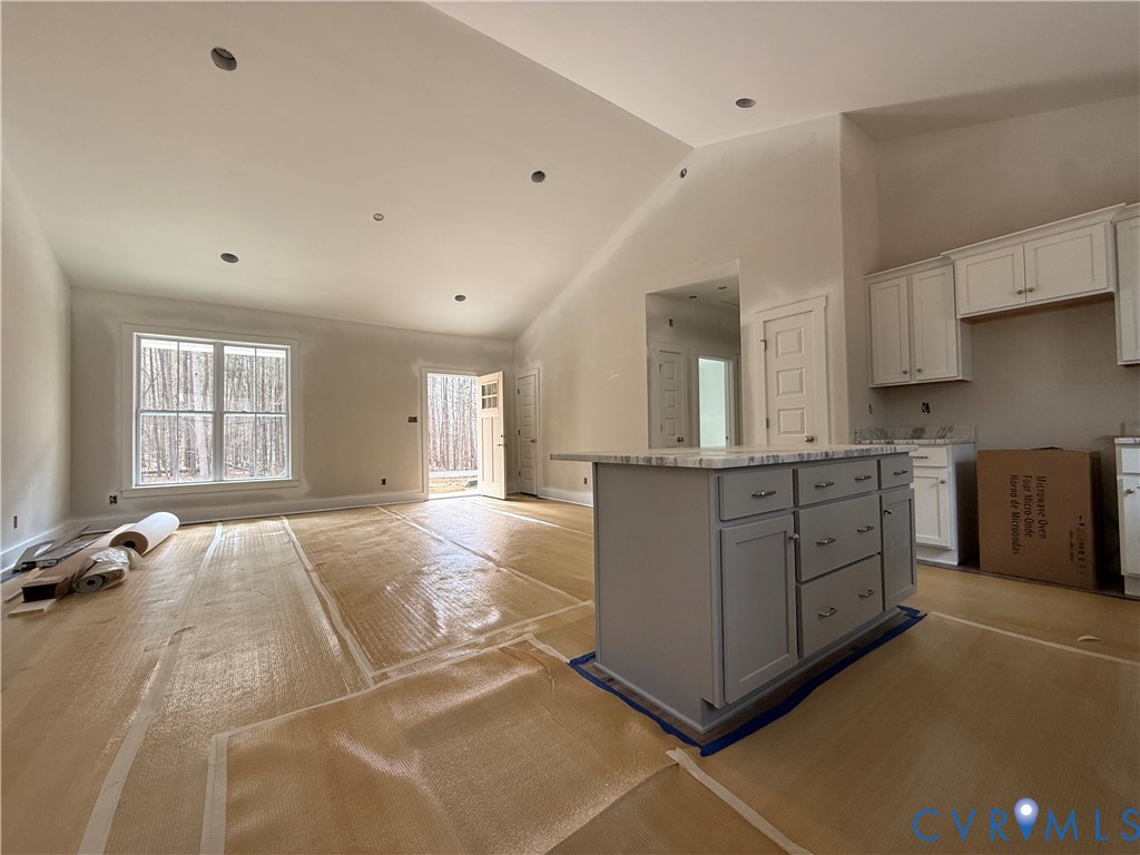295 Merifield Drive Clarksville, VA 23927 - Photo 29 of 32 a room with a bed and a cabinets