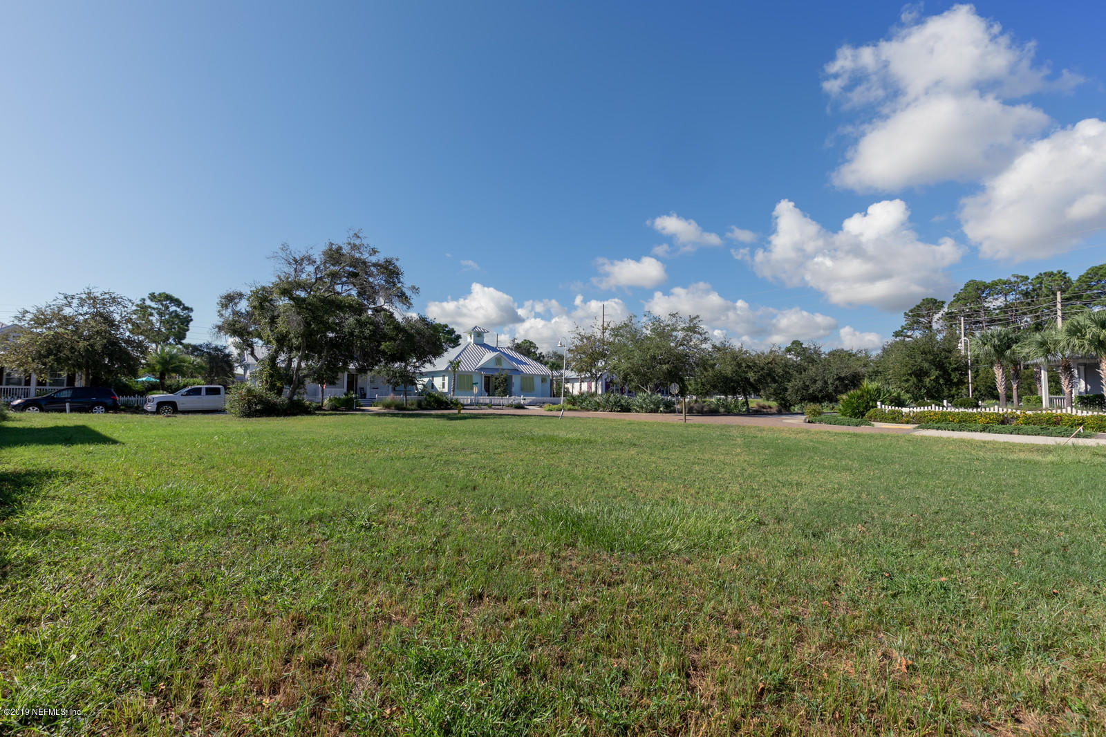 3743 Coconut Key Jacksonville Beach, FL 32250 - Photo 2 of 20 a view of building with outdoor space