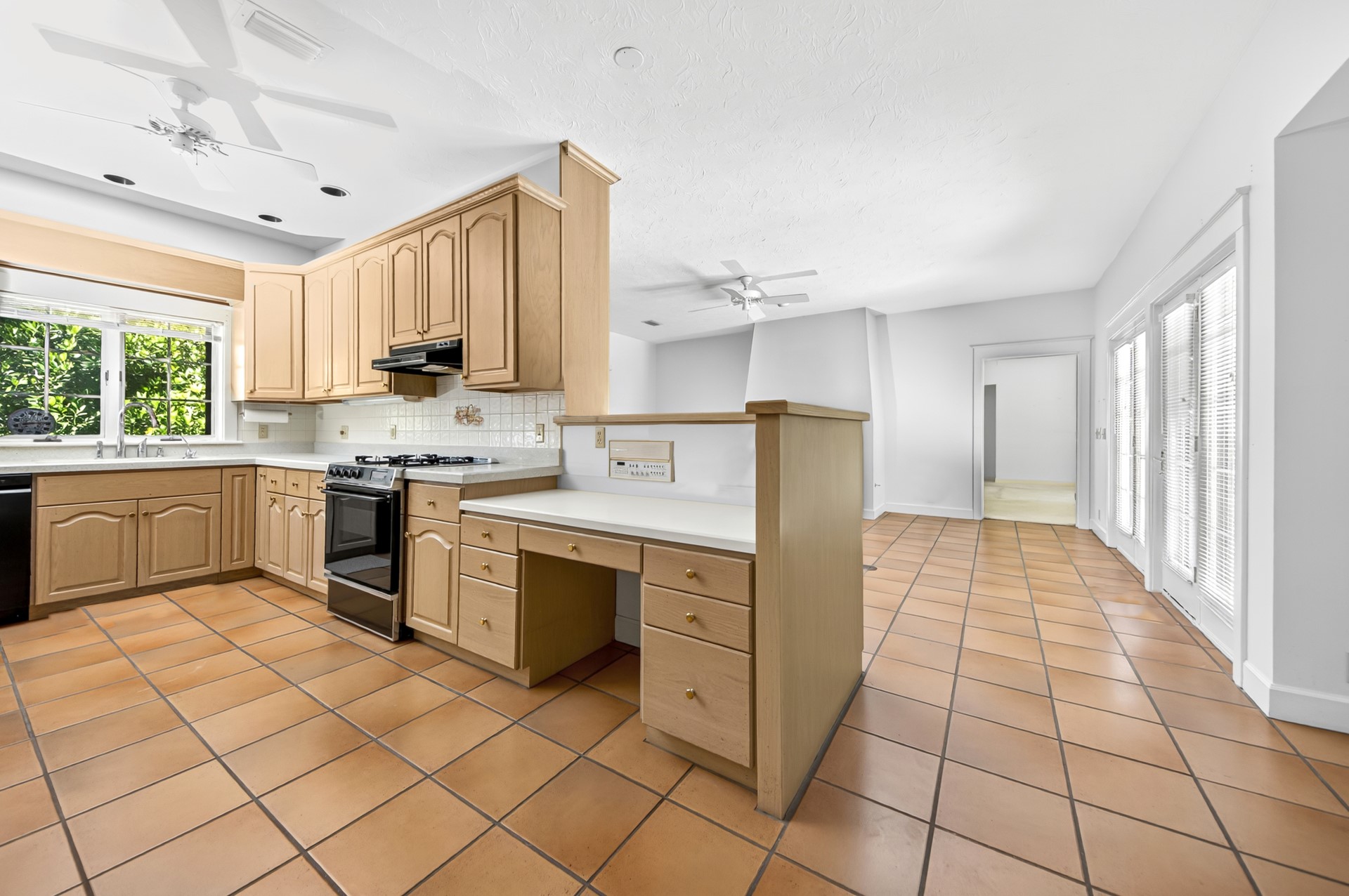 7 Hickory Lane Fernandina Beach, FL 32034 - Photo 12 of 42 a kitchen with a sink a stove and cabinets
