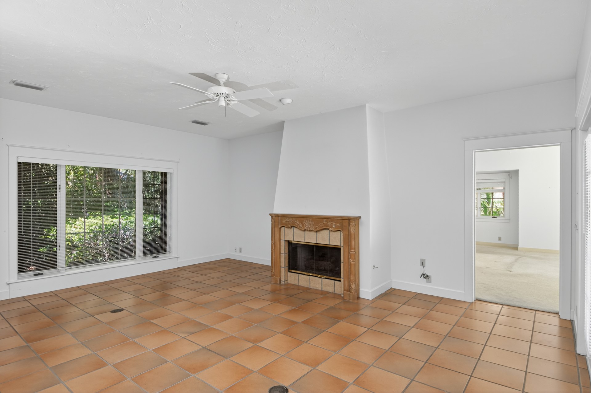 7 Hickory Lane Fernandina Beach, FL 32034 - Photo 15 of 42 an empty room with windows and fireplace