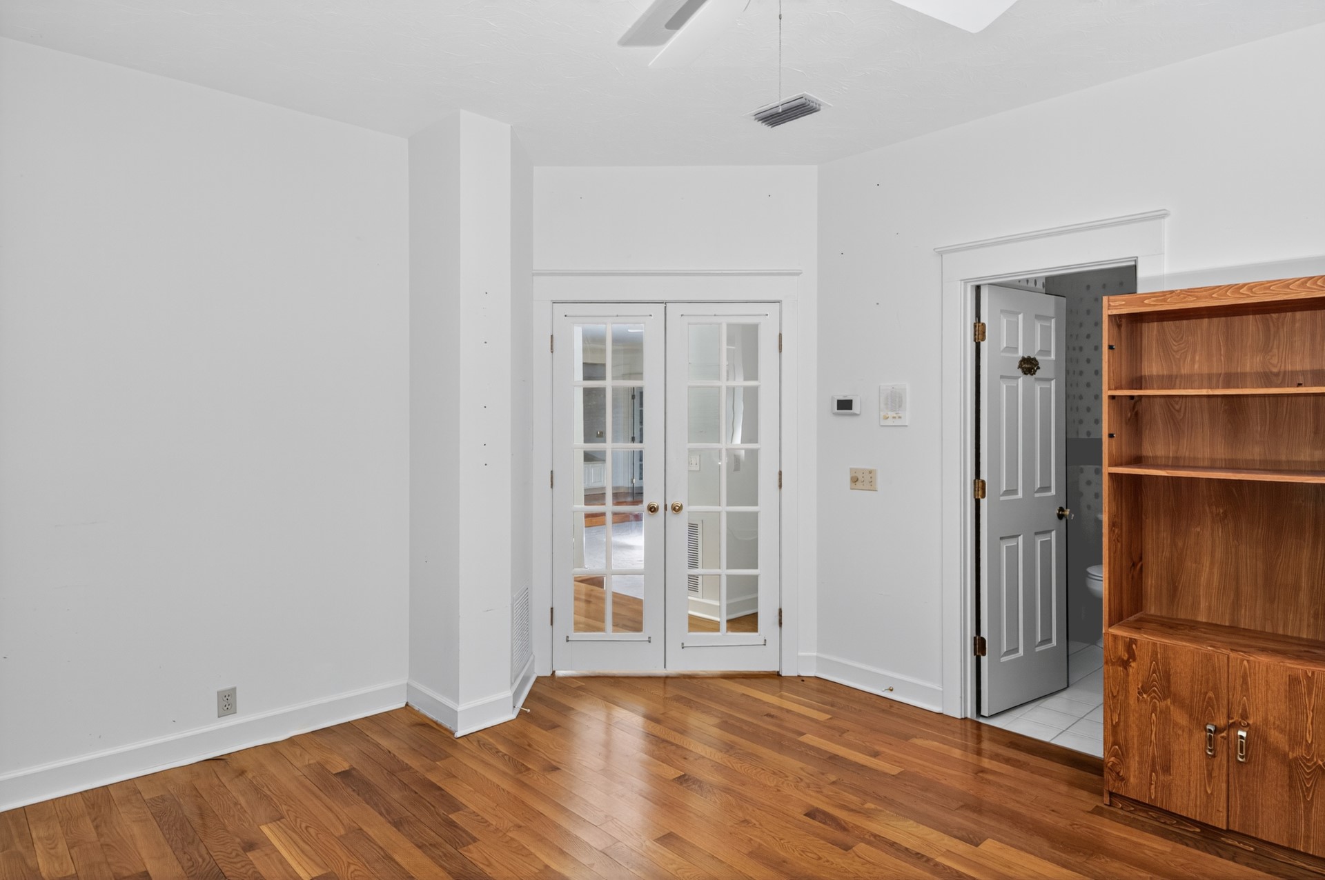 7 Hickory Lane Fernandina Beach, FL 32034 - Photo 24 of 42 a view of an empty room with closet and wooden floor