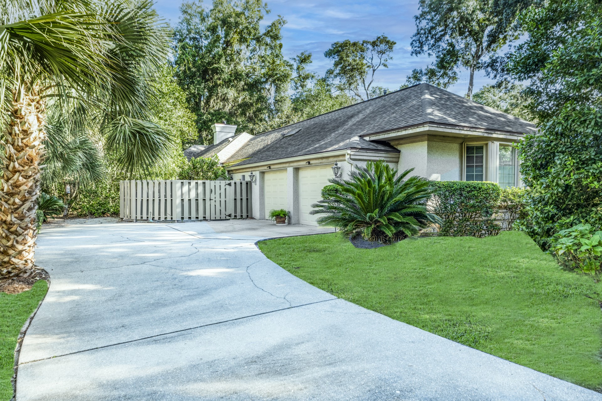7 Hickory Lane Fernandina Beach, FL 32034 - Photo 40 of 42 a front view of a house with garden