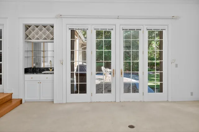 a view of kitchen with furniture and window