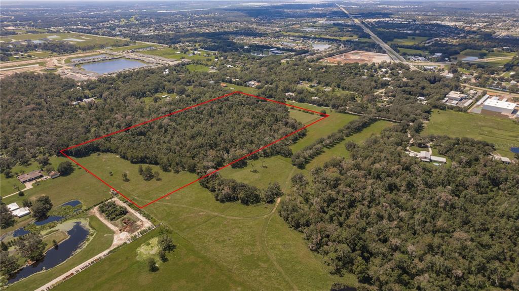 12355 Doris Road Parrish, FL 34219 - Photo 24 of 27 an aerial view of residential houses with outdoor space