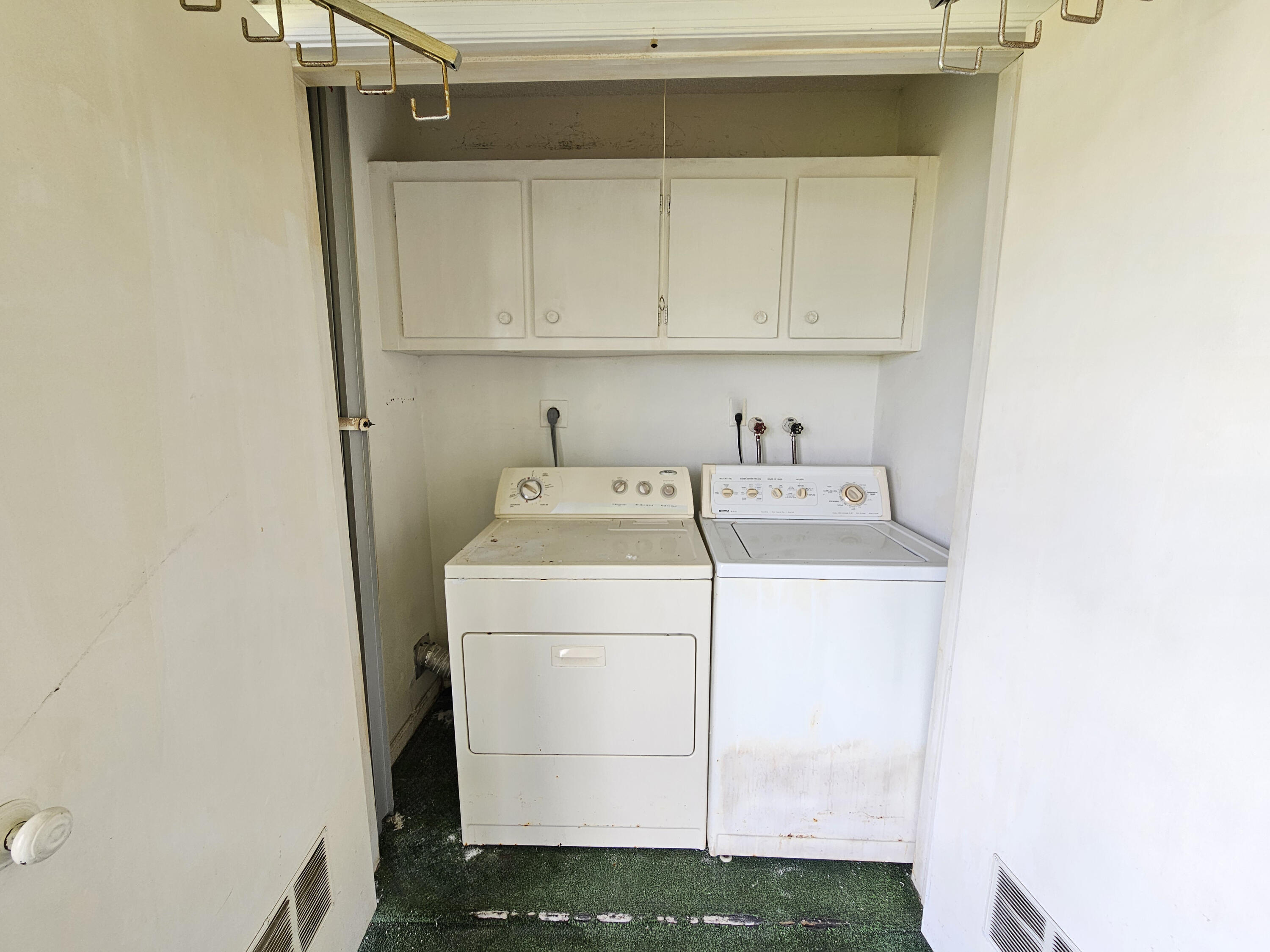 23385 South Barwood Lane, Unit 1203 Boca Raton, FL 33428 - Photo 16 of 22 a utility room with dryer and washer