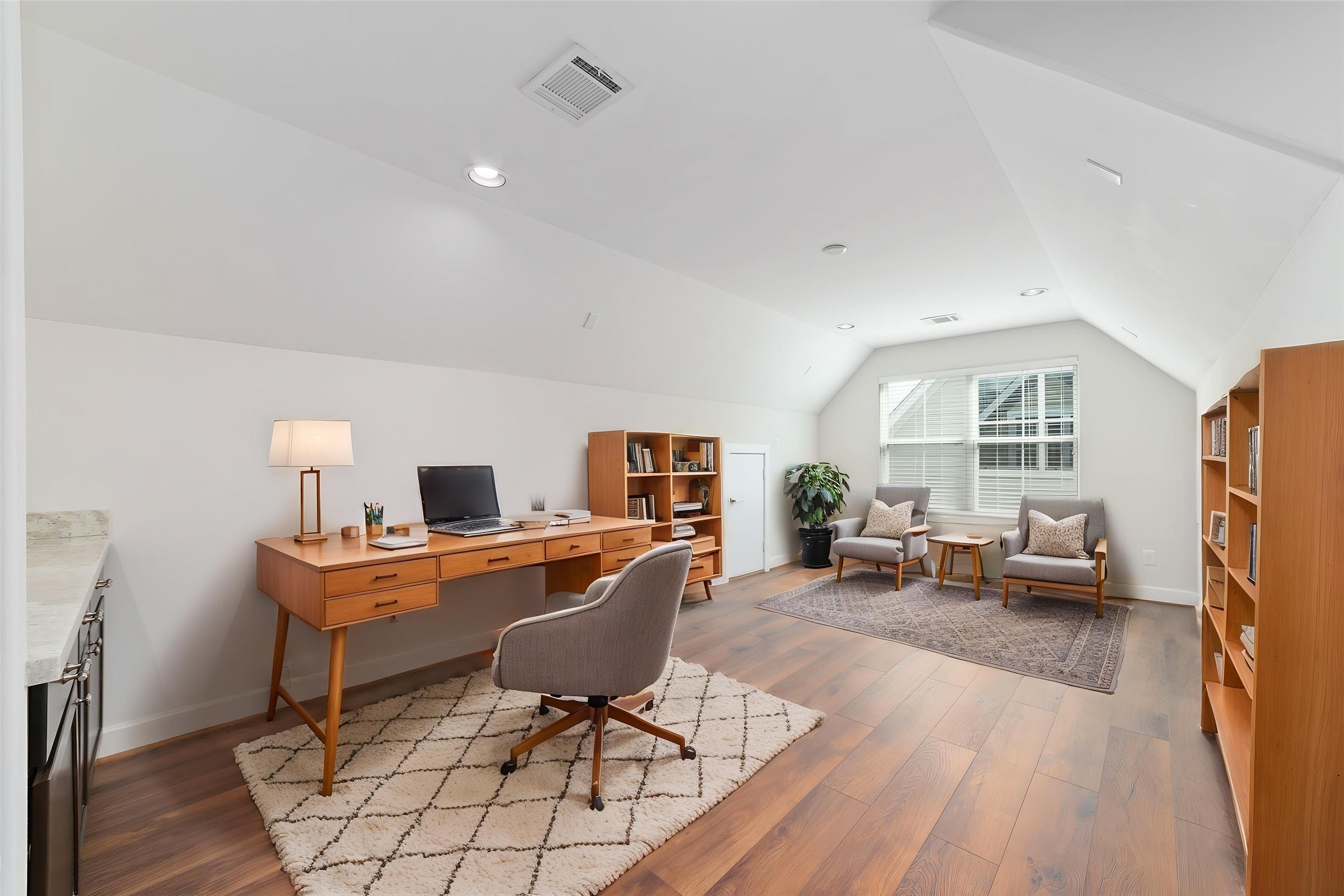 902 West 20th Street, Unit A Houston, TX 77008 - Photo 21 of 23 a workspace with furniture hardwood and a wooden floor