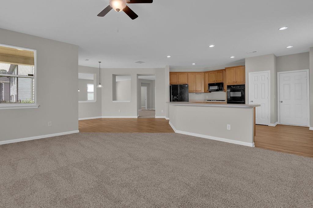 1978 Cutleaf Creek Road Southeast Grayson, GA 30017 - Photo 13 of 38 a view of a kitchen with a sink cabinets and wooden floor
