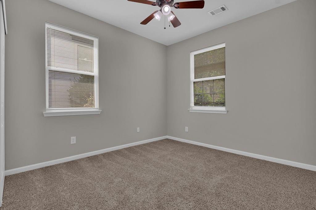 1978 Cutleaf Creek Road Southeast Grayson, GA 30017 - Photo 20 of 38 an empty room with a window