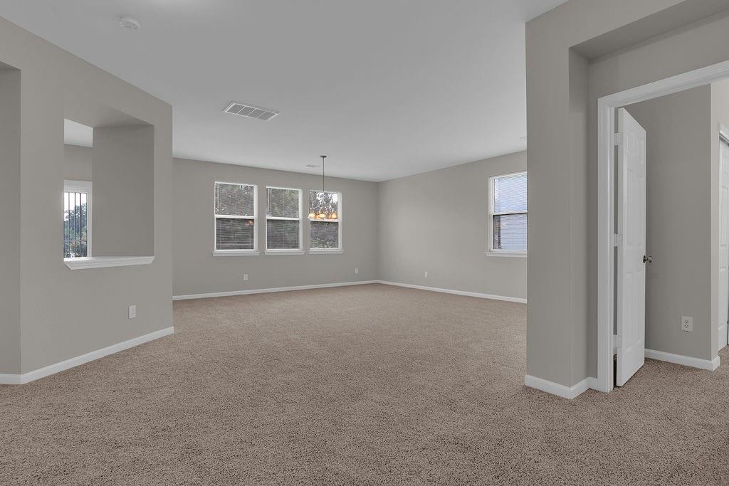 1978 Cutleaf Creek Road Southeast Grayson, GA 30017 - Photo 5 of 38 an empty room with windows and closet