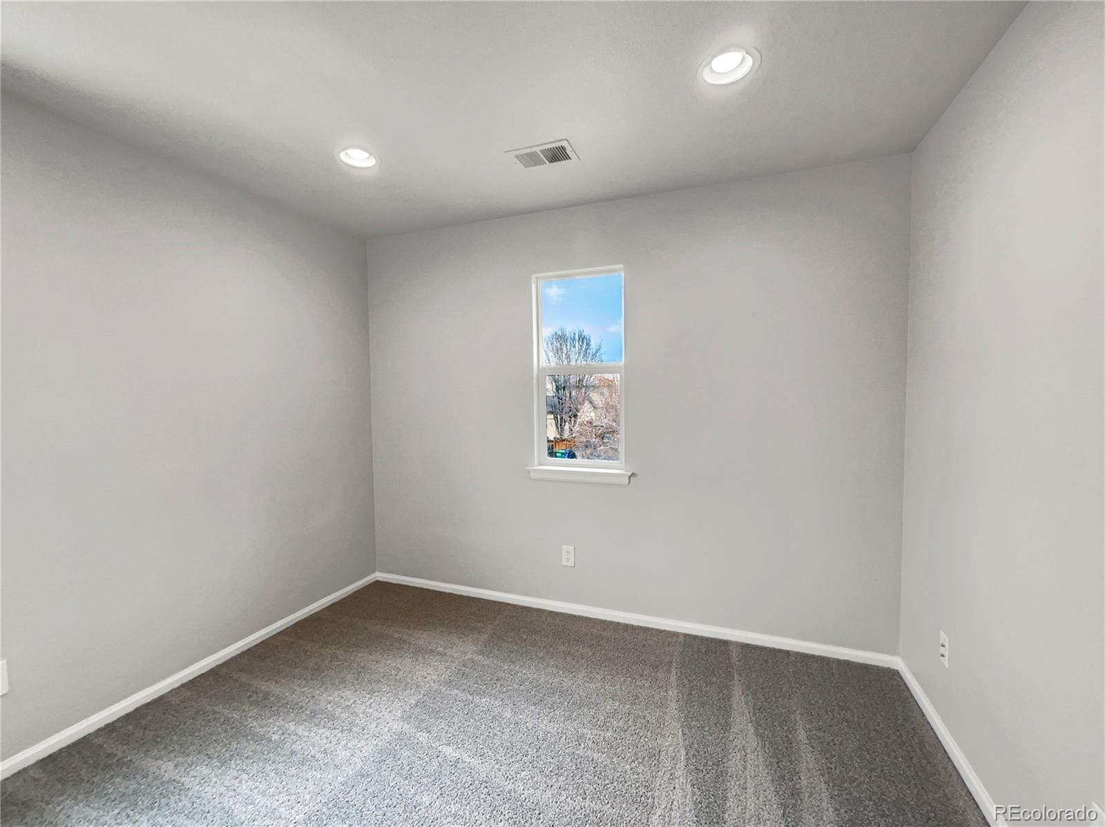 2380 Xanthia Way Denver, CO 80238 - Photo 12 of 19 an empty room with a window