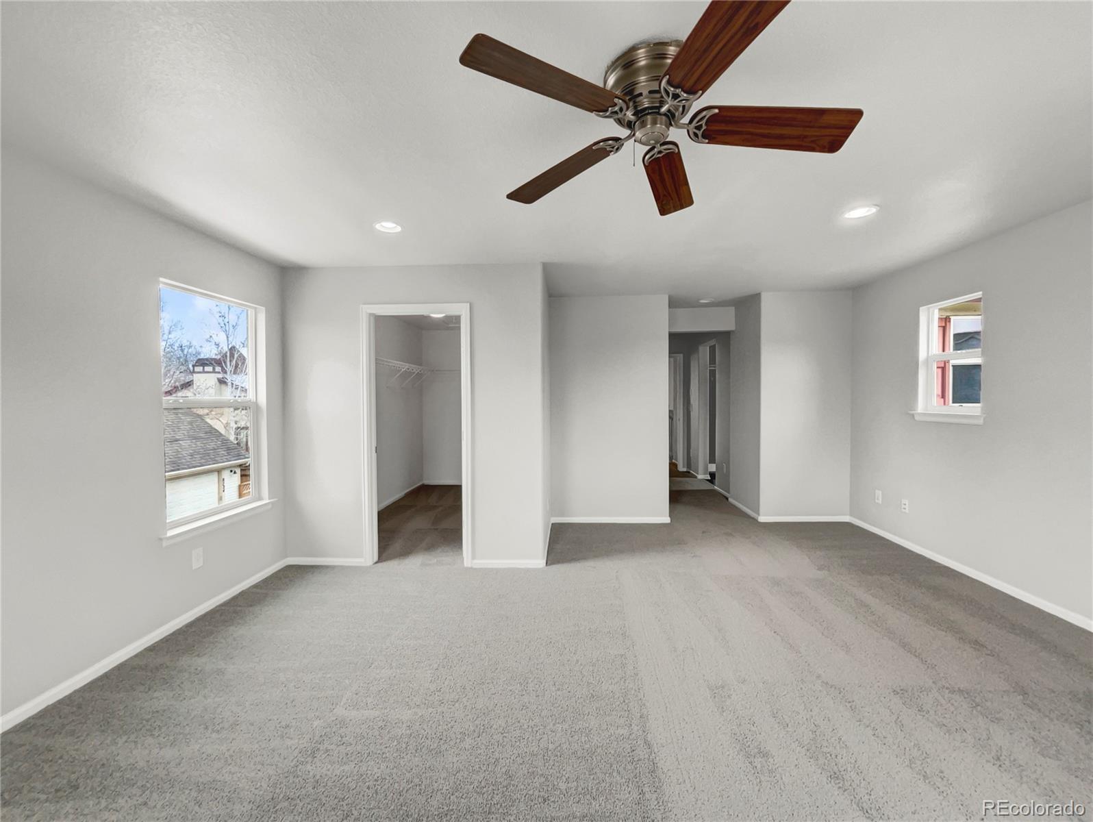 2380 Xanthia Way Denver, CO 80238 - Photo 18 of 19 a view of an empty room with a window