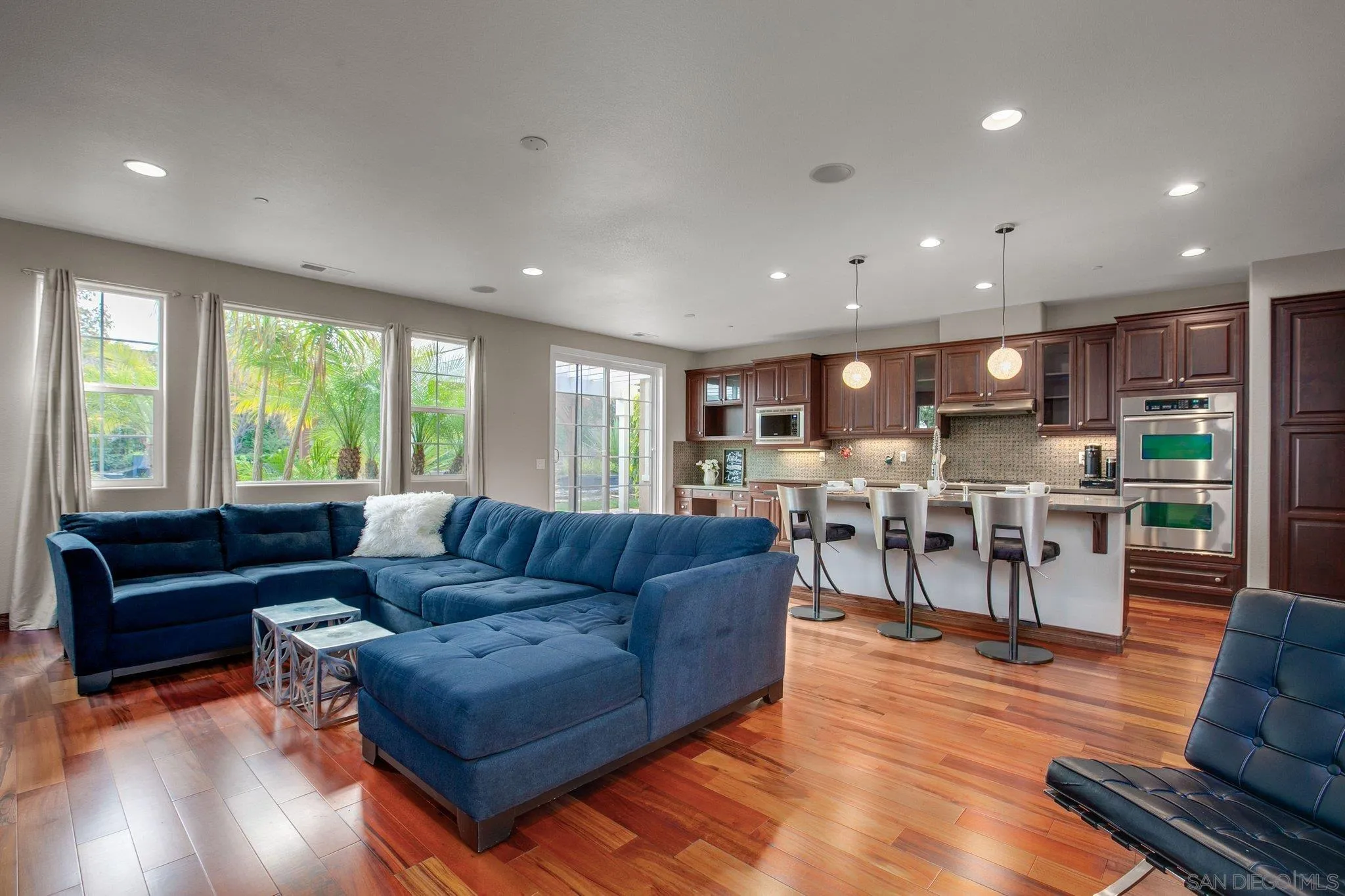 1104 Sagewood Drive Oceanside, CA 92056 - Photo 11 of 46 a living room with furniture and wooden floor