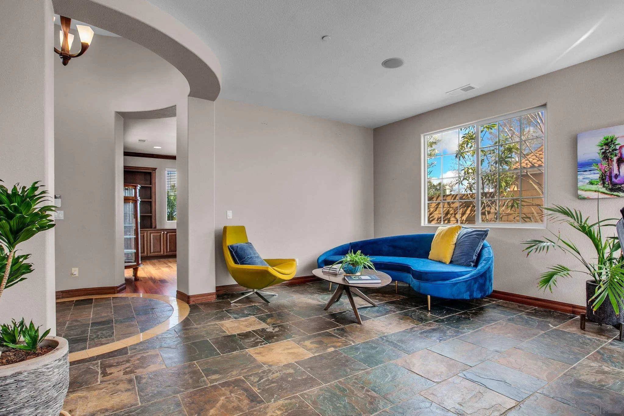 1104 Sagewood Drive Oceanside, CA 92056 - Photo 16 of 46 a living room with furniture and a potted plant