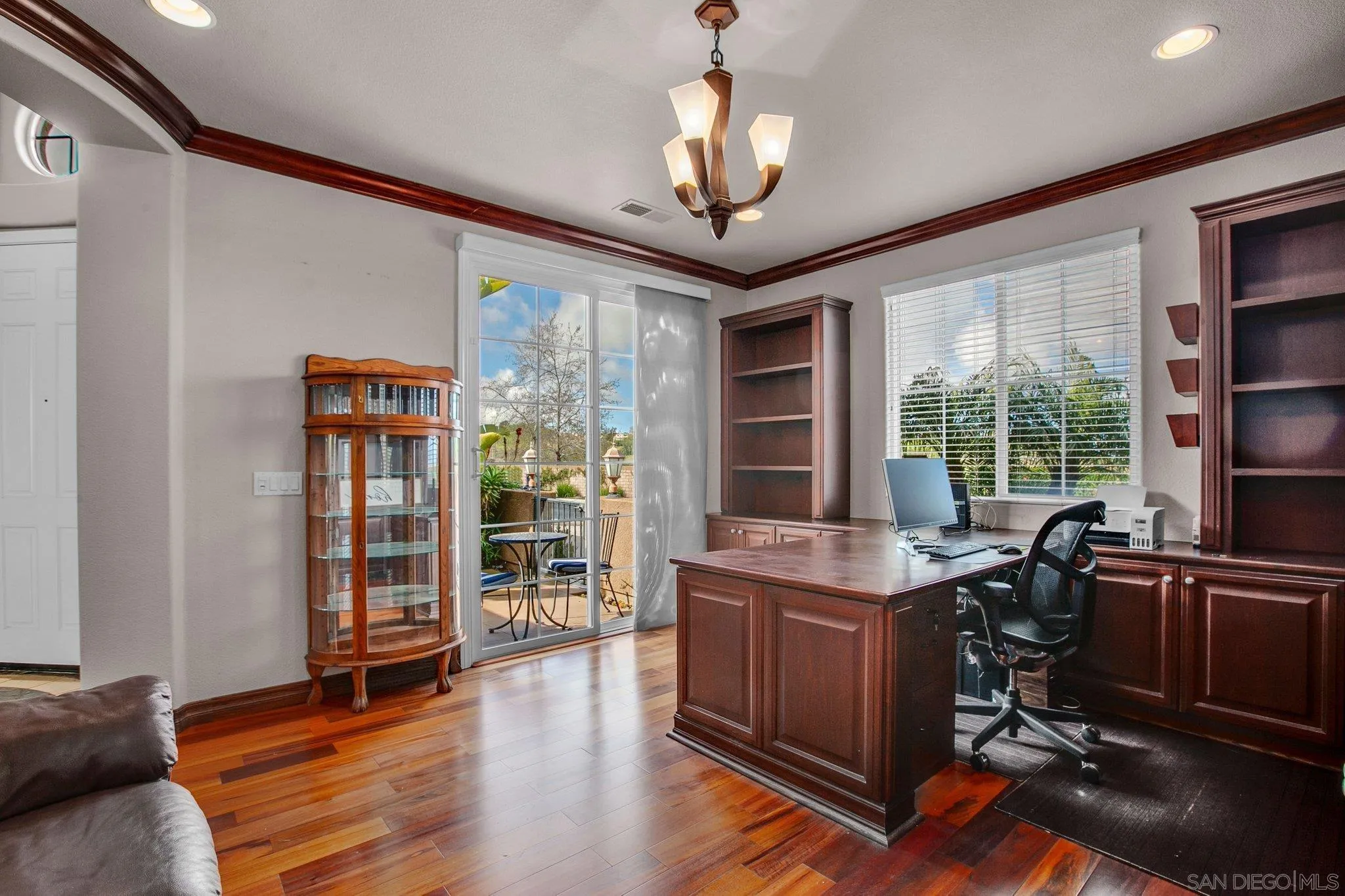1104 Sagewood Drive Oceanside, CA 92056 - Photo 18 of 46 a view of a workspace with furniture and a window