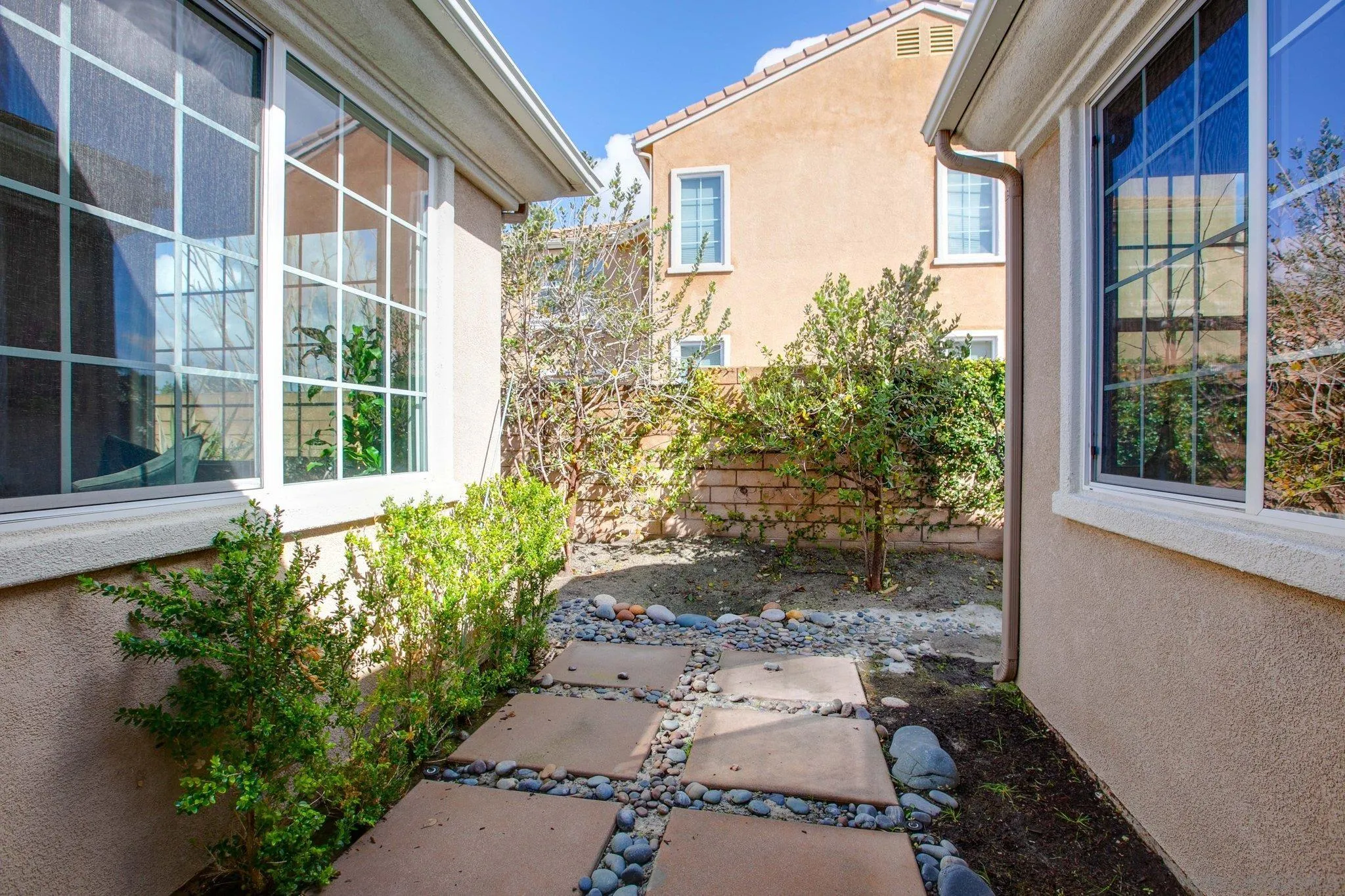 1104 Sagewood Drive Oceanside, CA 92056 - Photo 21 of 46 a front view of a house with a yard