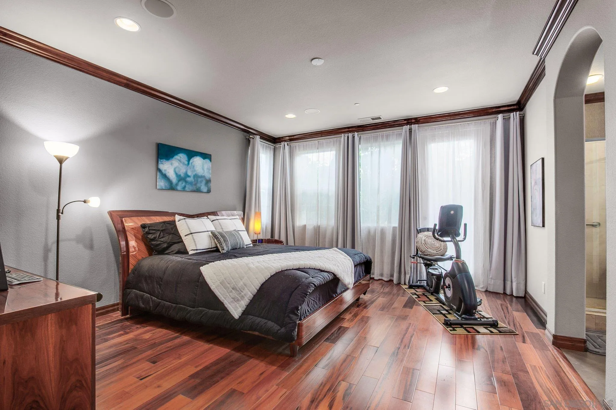 1104 Sagewood Drive Oceanside, CA 92056 - Photo 22 of 46 a bed room with a bed and a couch