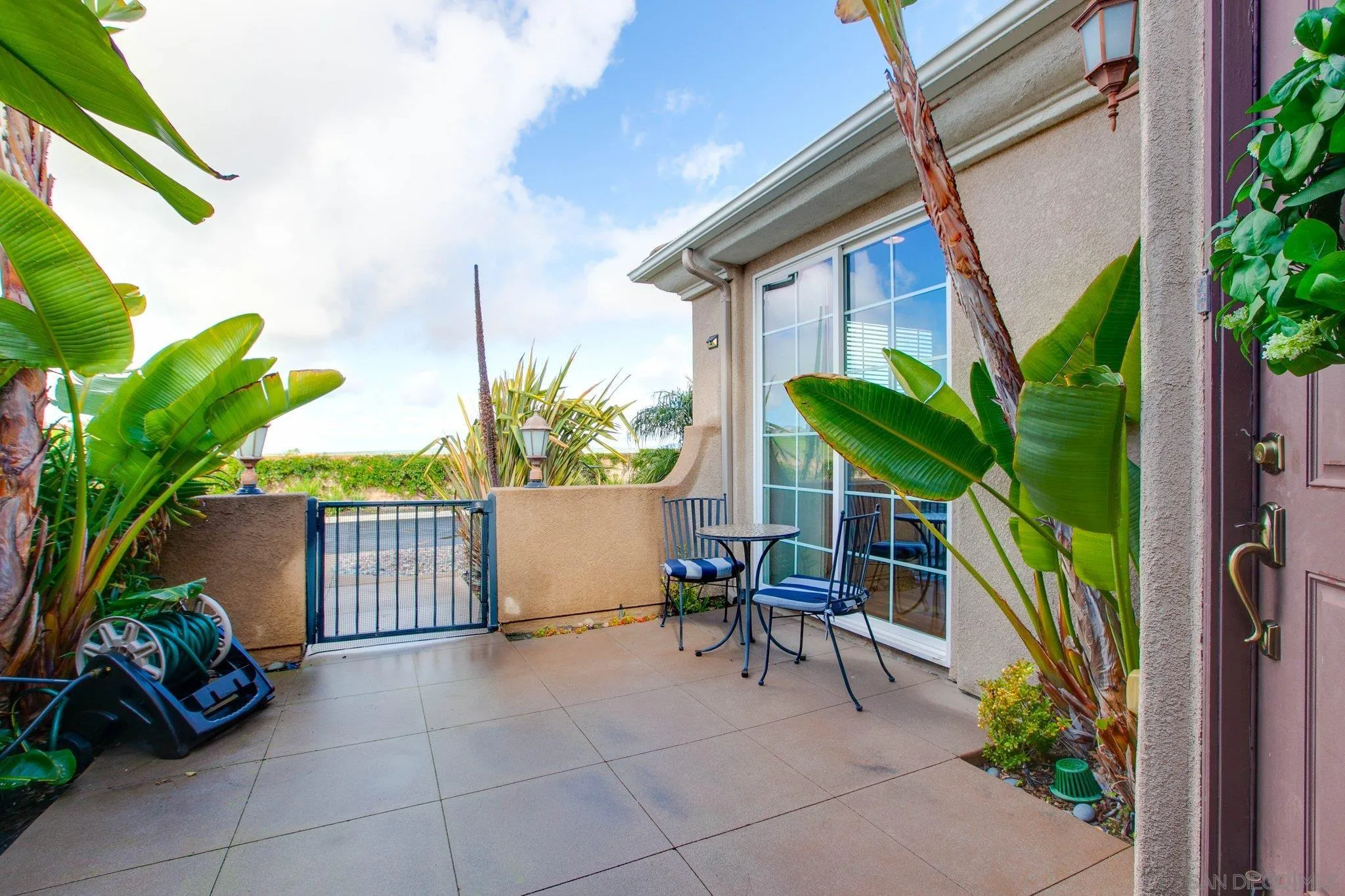 1104 Sagewood Drive Oceanside, CA 92056 - Photo 3 of 46 a view of entryway with flower pots
