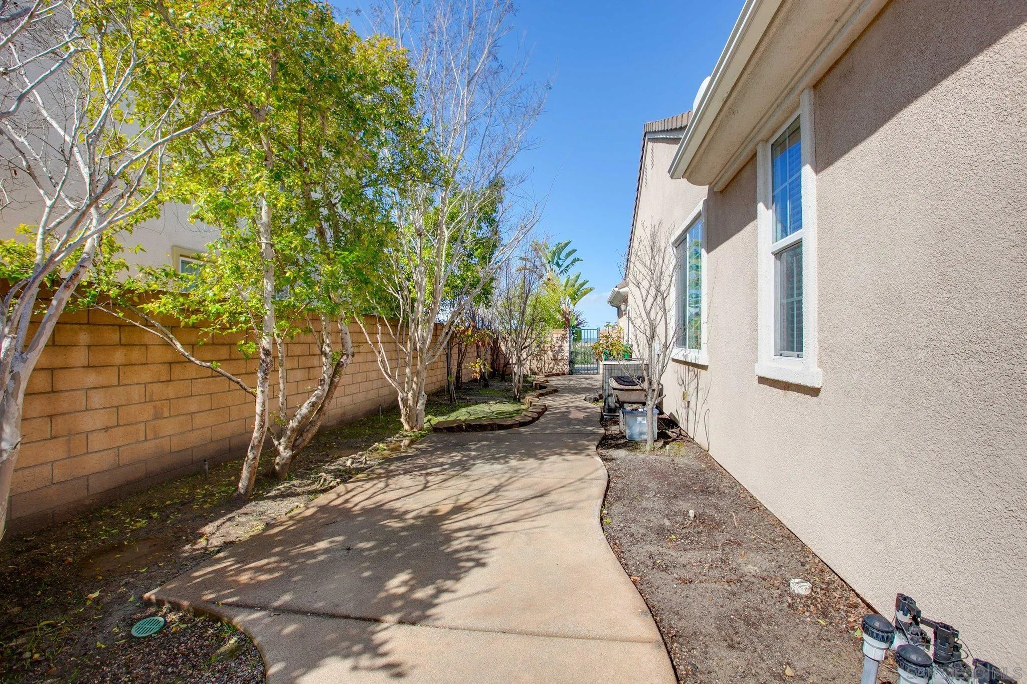 1104 Sagewood Drive Oceanside, CA 92056 - Photo 36 of 46 a view of a backyard with sitting area and furniture