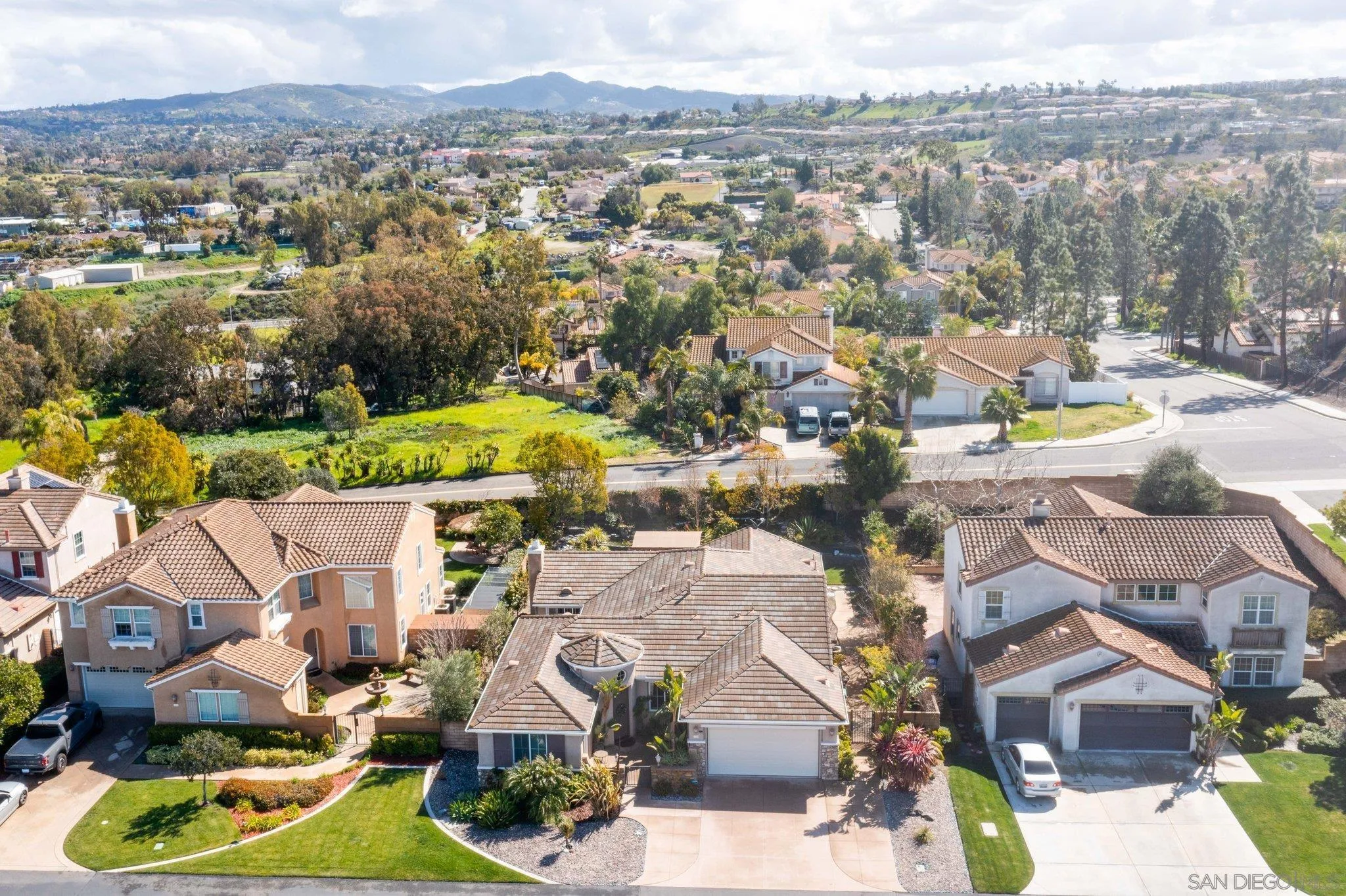 1104 Sagewood Drive Oceanside, CA 92056 - Photo 38 of 46 an aerial view of residential houses with outdoor space