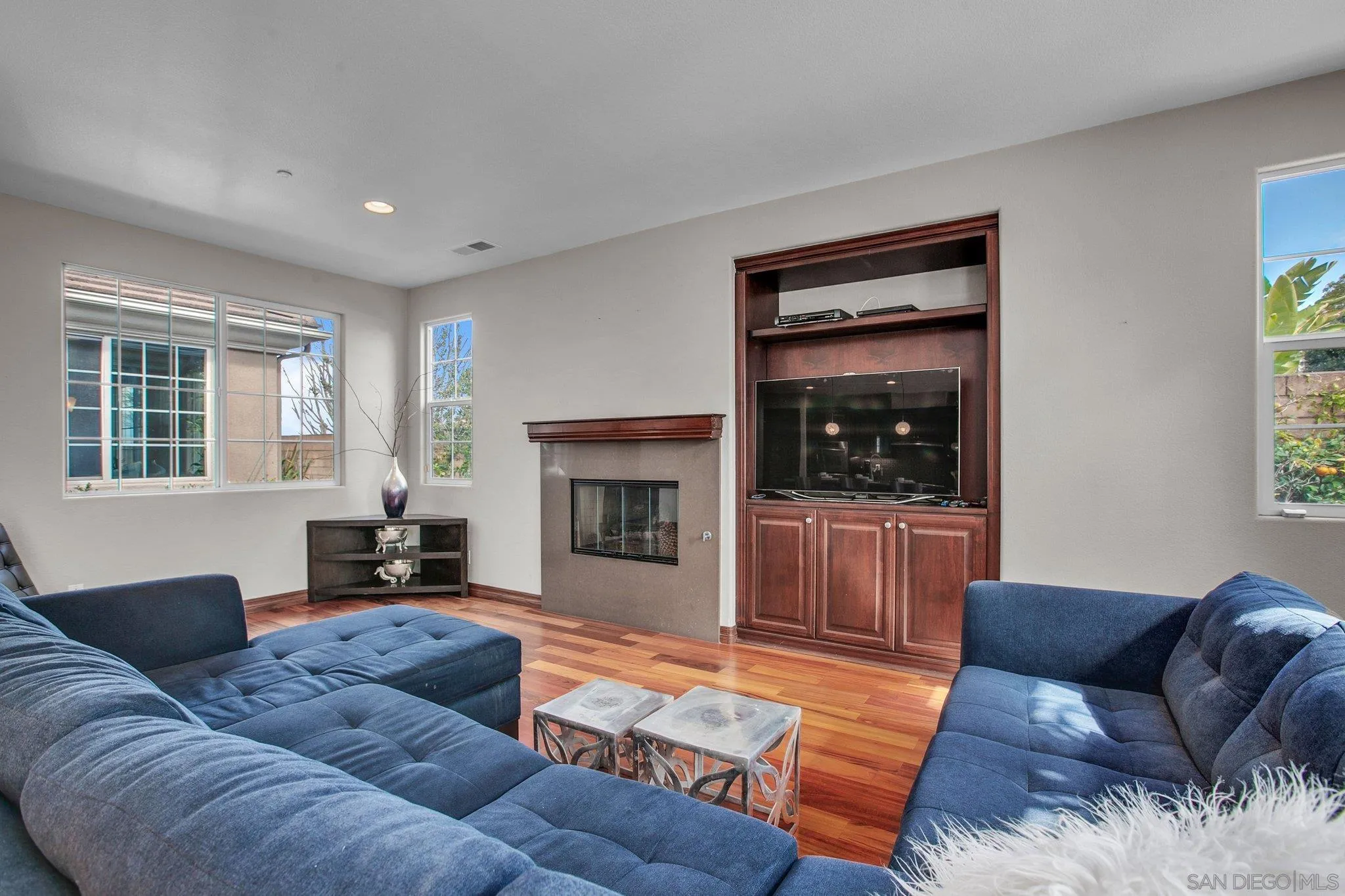1104 Sagewood Drive Oceanside, CA 92056 - Photo 10 of 46 a living room with furniture and a fireplace