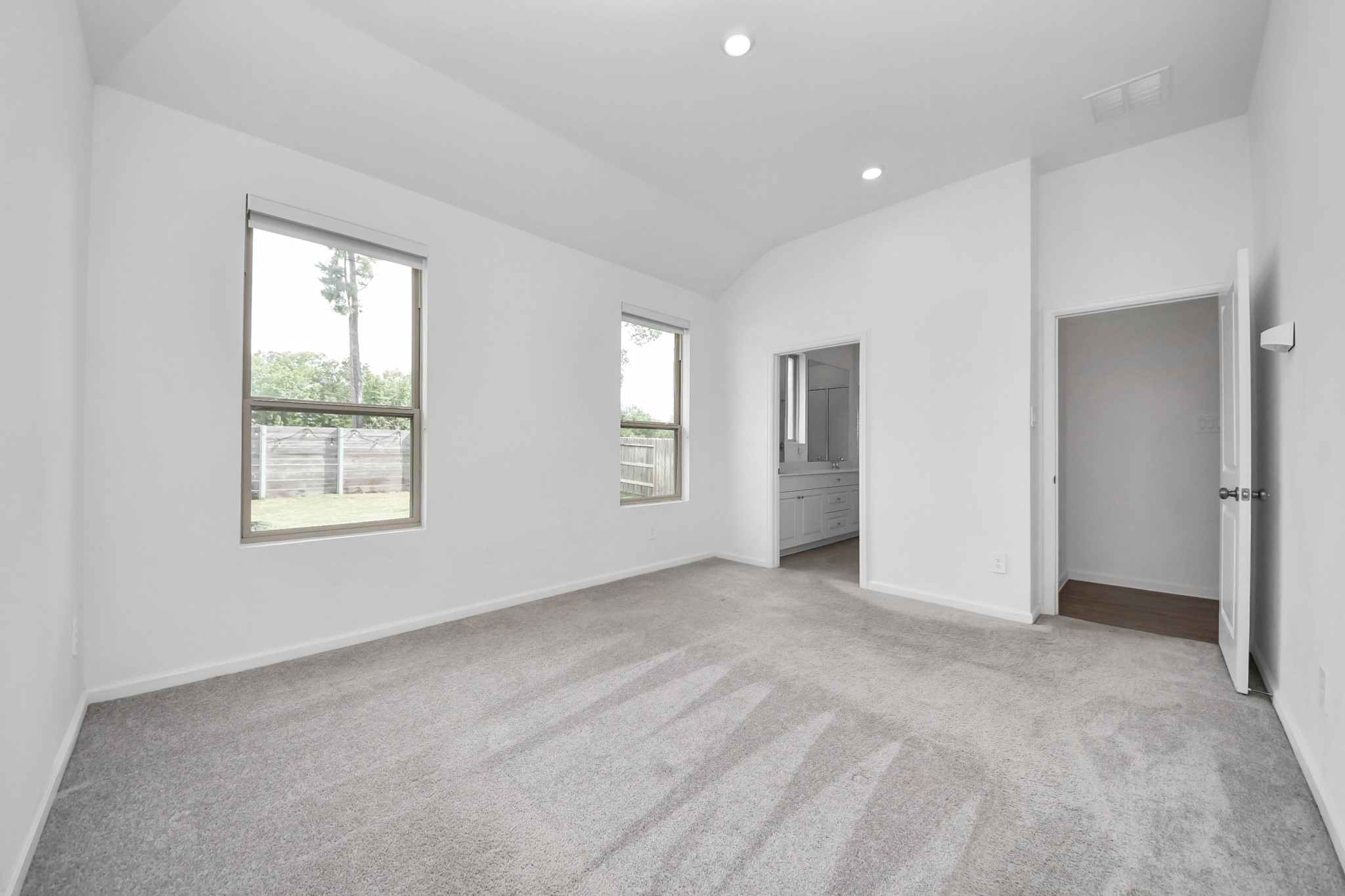 15623 Red Panda Road Conroe, TX 77302 - Photo 13 of 37 Primary Bedroom with ensuite bath and large walkin closet.