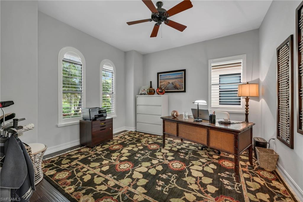 6714 Canwick Cove Circle Naples, FL 34113 - Photo 15 of 23 a living room with furniture and a window