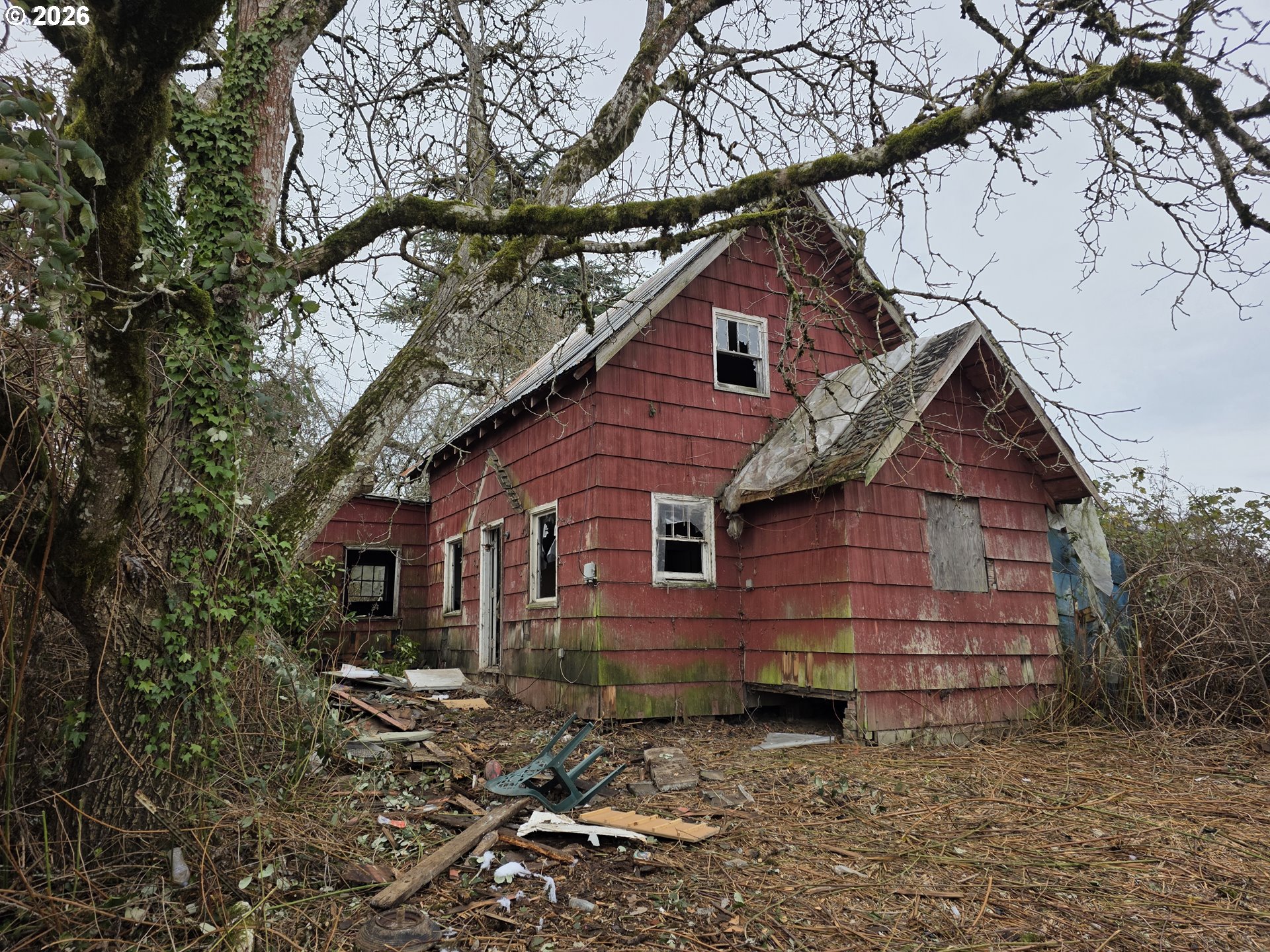 5150 Northwest Glencoe Road Hillsboro, OR 97124 - Photo 4 of 5 a view of a house with a yard