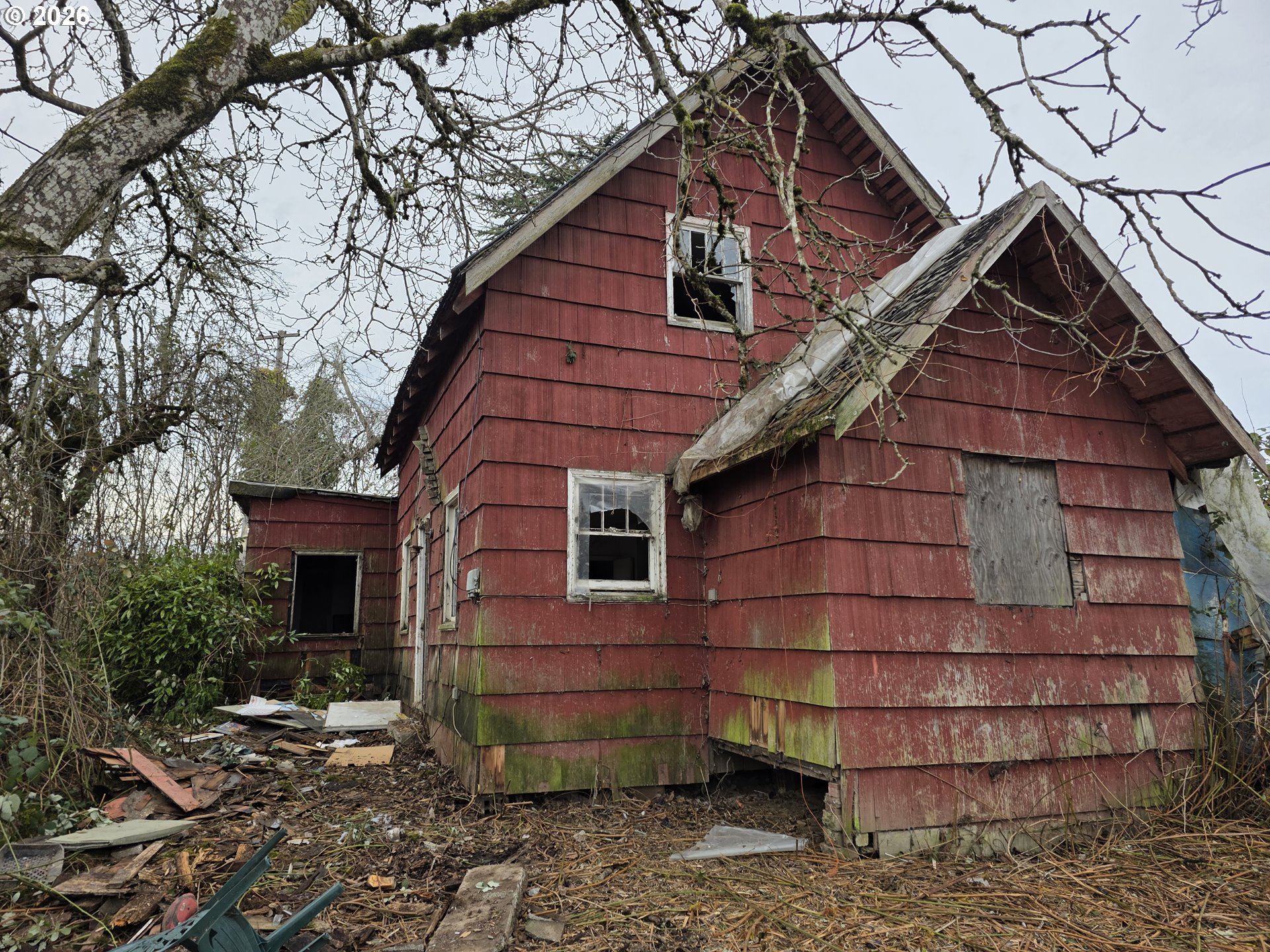 5150 Northwest Glencoe Road Hillsboro, OR 97124 - Photo 5 of 5 a front view of a house with a yard