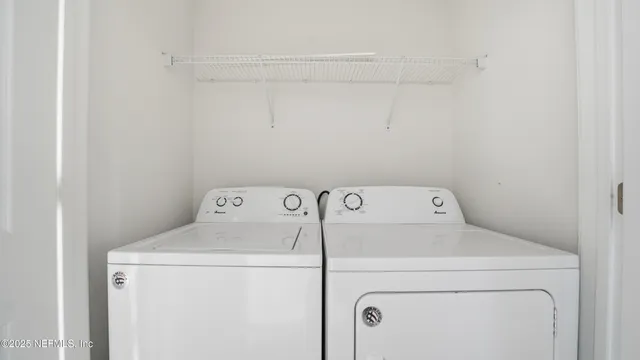 a view of swimming pool with outdoor seating