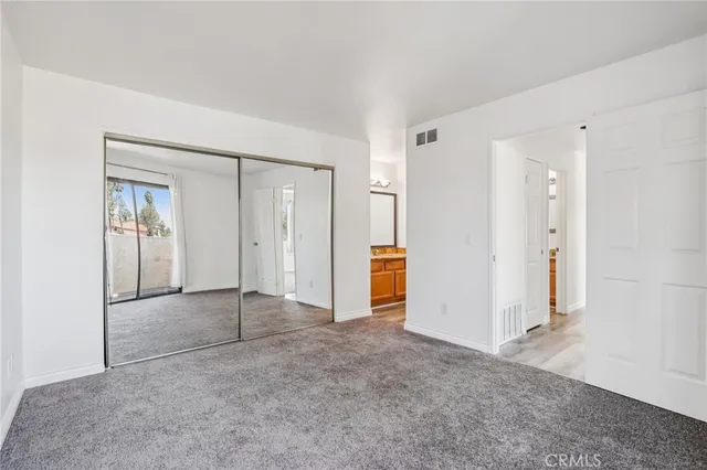 an empty room with a bathroom