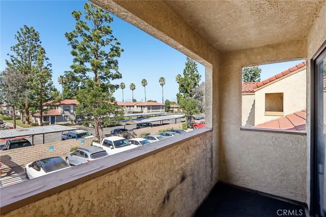 a view of swimming pool from a balcony