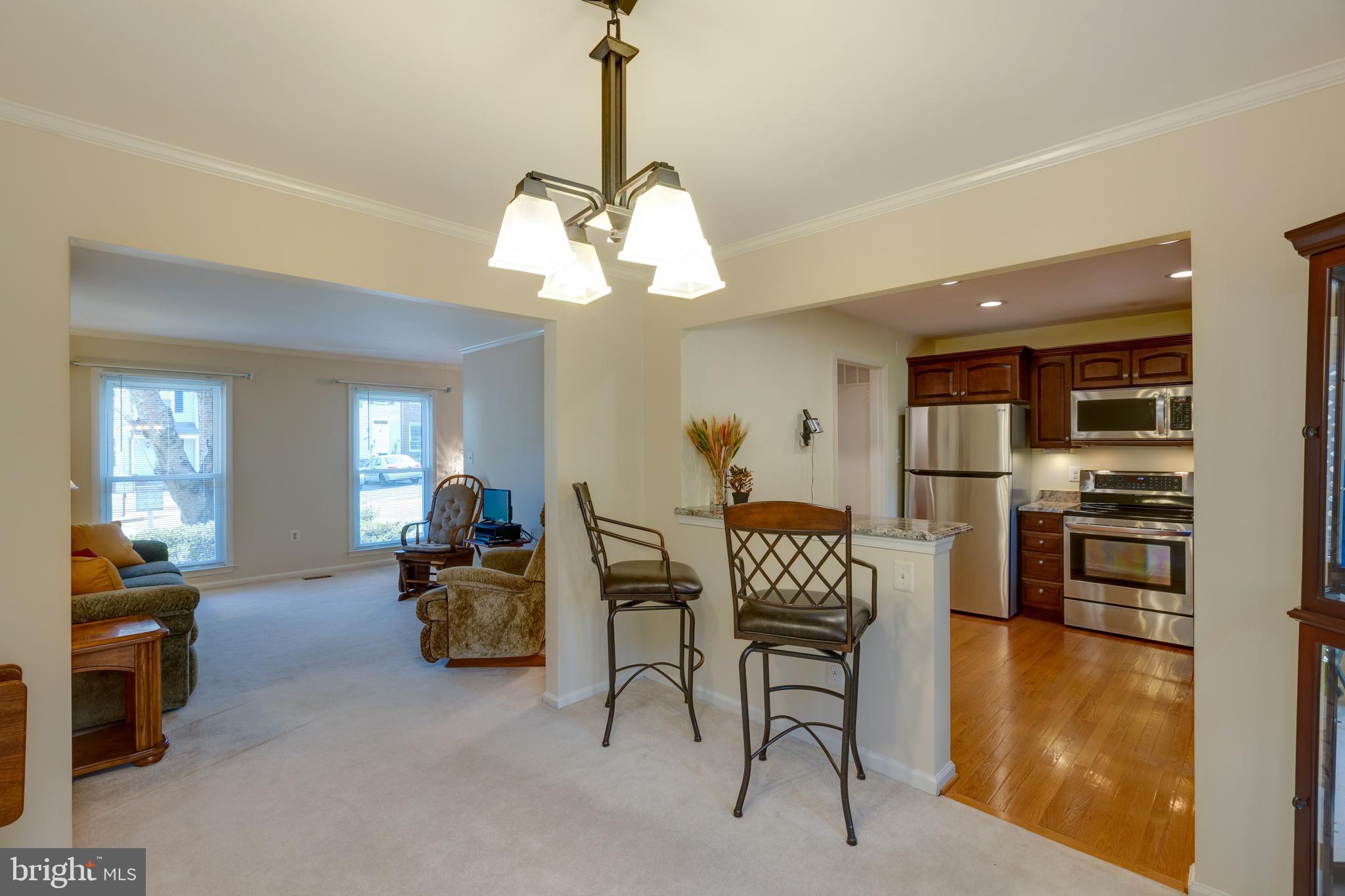 7940 Forest Path Way Springfield, VA 22153 - Photo 12 of 49 Bar area between kitchen and dining room