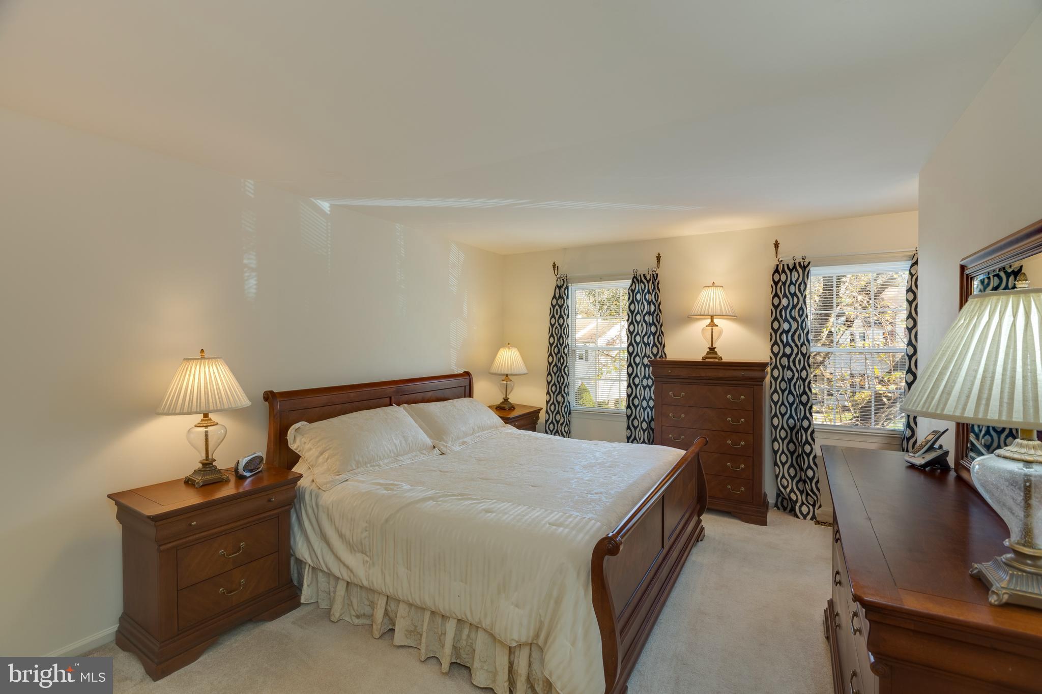 7940 Forest Path Way Springfield, VA 22153 - Photo 23 of 49 The spacious master bedroom with ensuite