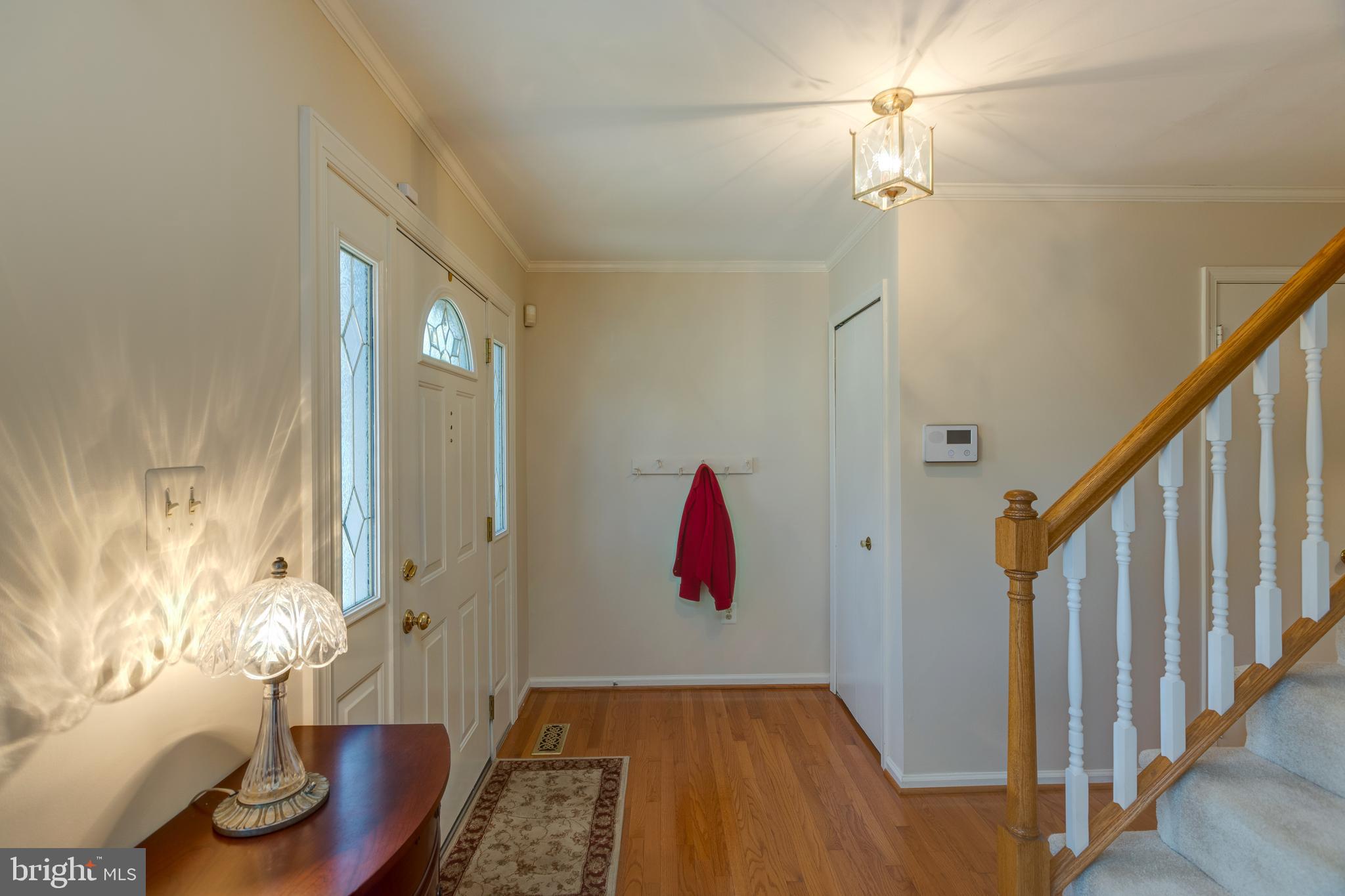 7940 Forest Path Way Springfield, VA 22153 - Photo 6 of 49 Foyer entrance with wood flooring